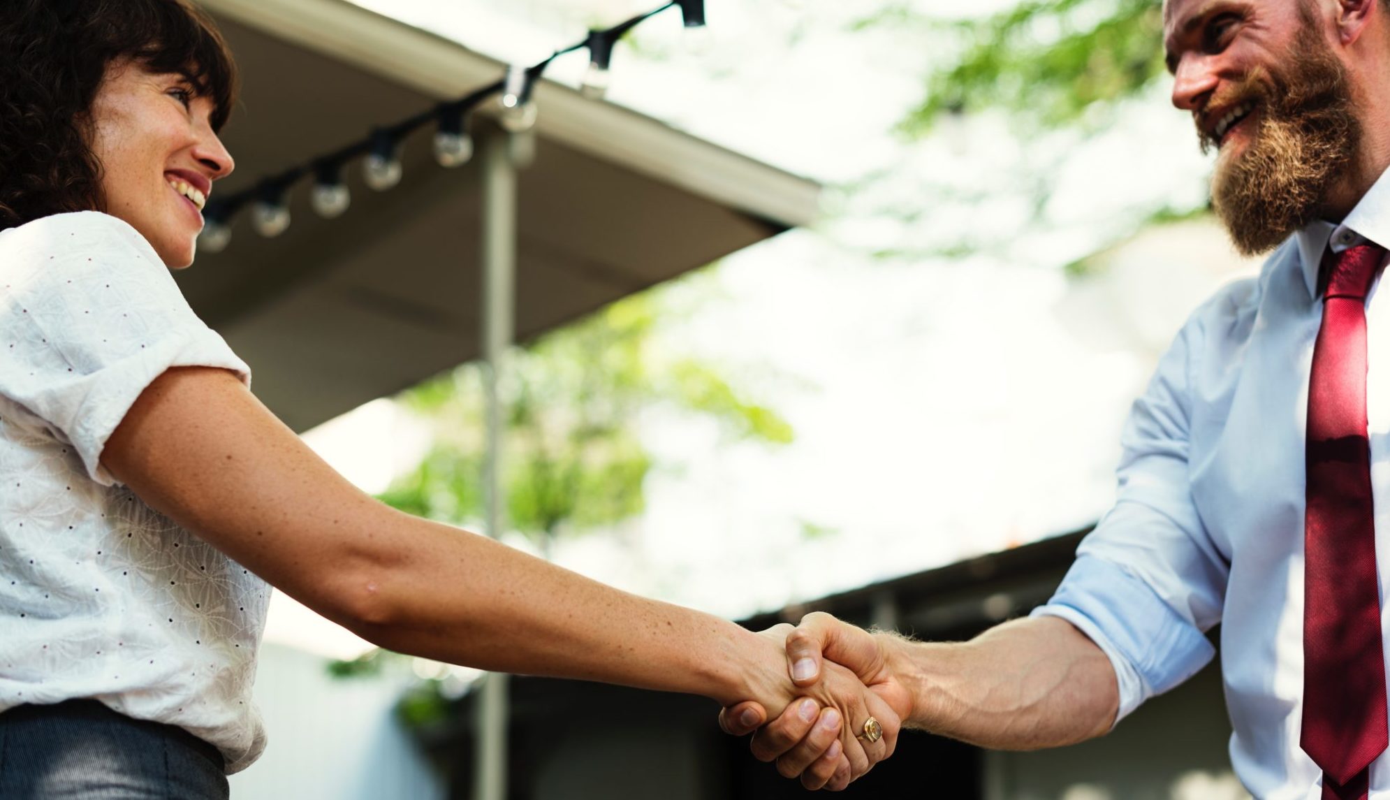Talk to the Person not the Role – Petros – Lady and Man shaking hands 'Talk to the person not the role' - Petros - Resilience for Life